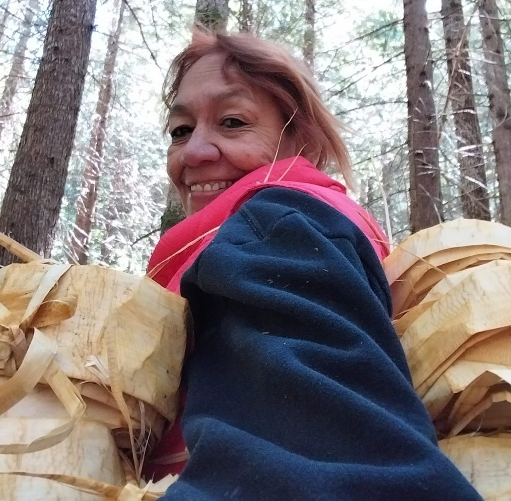 Marlene King with cedar she gathered