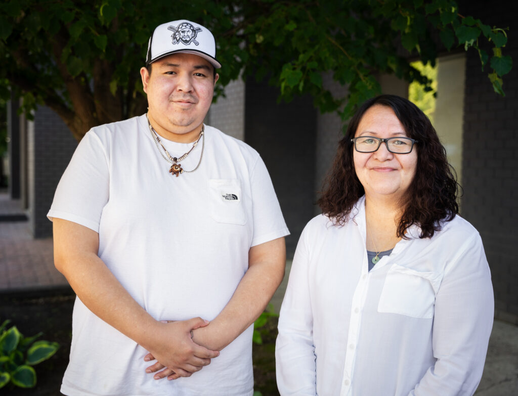 Mother and son standing next to each other at the FPCC Mentor-Apprentice Program training
